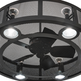 Close-up of fan blades and light housing inside mesh frame.