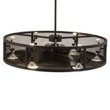 Top angled lit view showing uplights and mesh bronze structure.