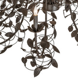 Closeup of Pear Leaf chandelier arm with leaf detailing and candle bobeche.