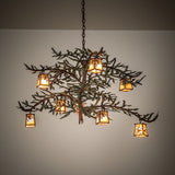 Ambient view of chandelier casting a warm glow through iridescent lantern shades.