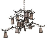 Unlit view of chandelier showing pine needle metal detailing and copper vein finish.