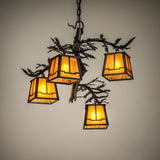 Illuminated in ambient room setting with warm amber mica glow and rustic pine branch detailing.