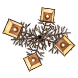 Bottom view of chandelier showing glass interiors and lights.