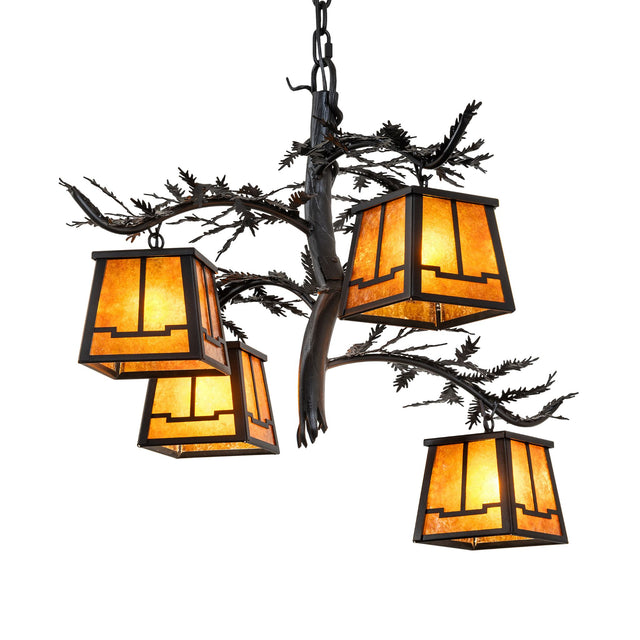 Lit view of chandelier with amber mica lantern shades and pine branch metal arms.