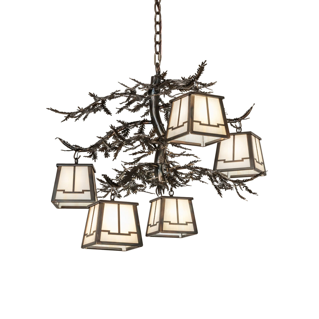 Lit view of 5 light chandelier glowing with beige art glass lanterns.