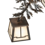 Close-up detail of lantern connection to pine metal branch structure on the chandelier.