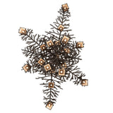 Bottom view of chandelier showing lantern alignment and branch symmetry.