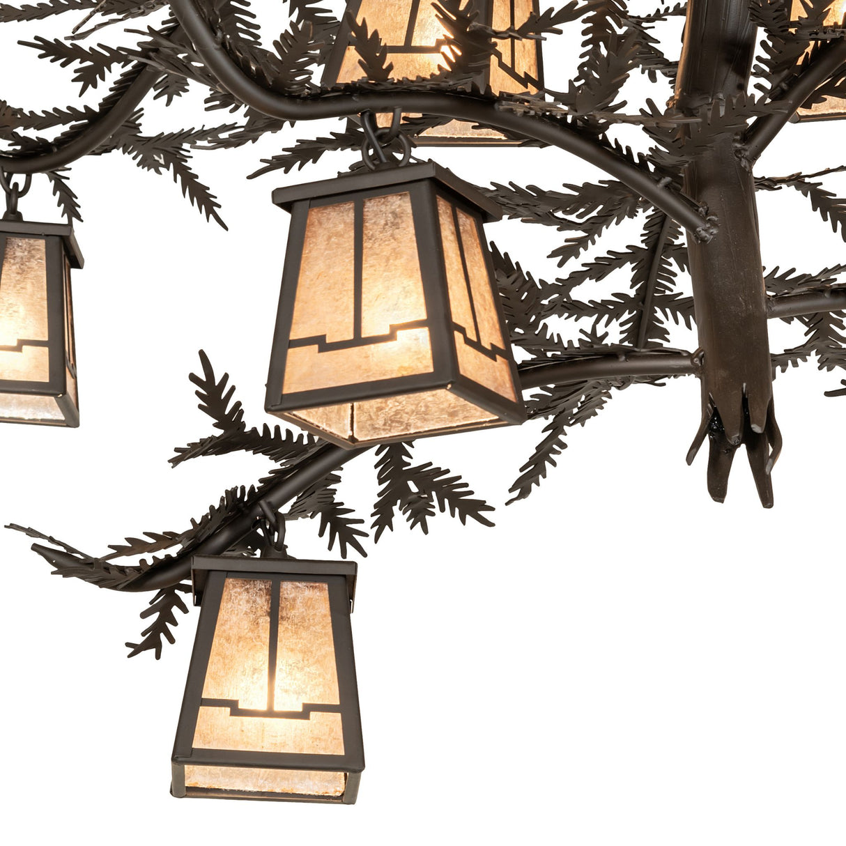 Detailed view of pine branch metal arms and needle accents on Valley View chandelier.