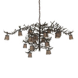 Unlit view chandelier showing natural pine branch structure and lantern shades.