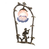pink and blue cherub mini lamp highlighting the intricate trellis and glass shade.