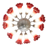 Bottom view of chandelier revealing decorative central canopy and glass shades.