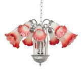 Unlit front view of chandelier with curved metal arms and decorative glass shades.