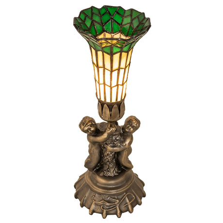 Front view of the Pond Lily Twin Cherub Accent Lamp with green and beige stained glass shade.