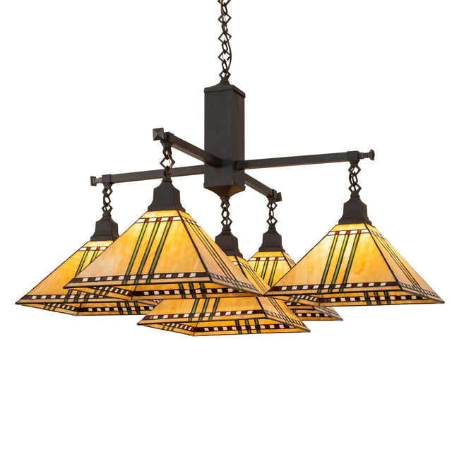 Lit view of chandelier with maize gold-stained glass shades and craftsman brown hardware.