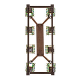 Bottom view of oblong chandelier showing eight stained glass shades arrangement.