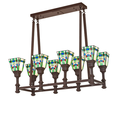 Lit view of 8-light oblong chandelier with stained glass shades and cafe noir finish.