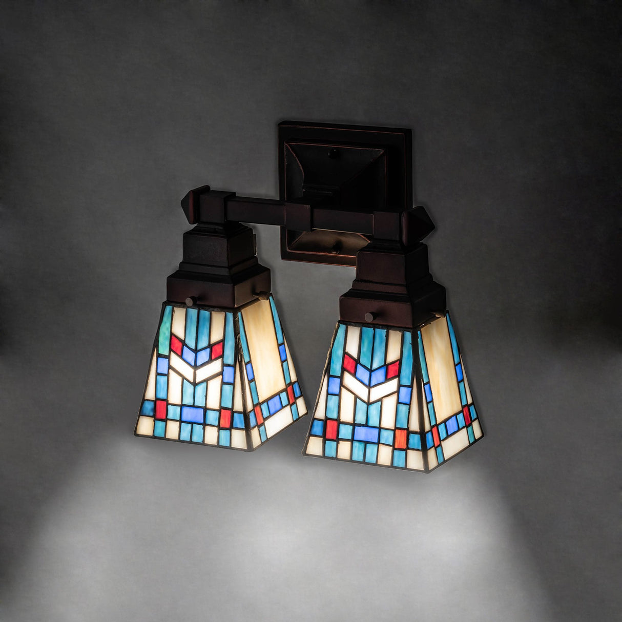 Lighting effect of Prairie Wheat Wall Sconce creating a warm ambiance on a wall.