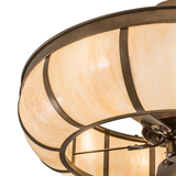 Close-up of dome edge showing smooth bronze finish and glowing Idalight diffuser.