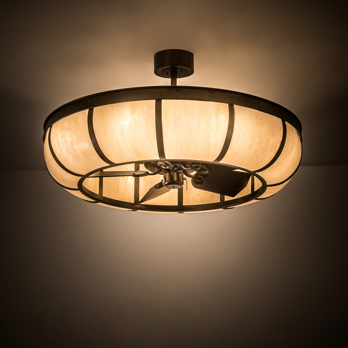Warmly illuminated Prime Dome Chandel-Air lighting a softly lit interior.