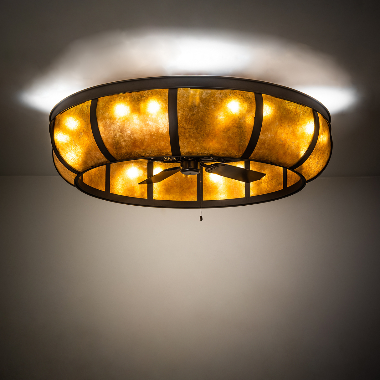 Prime Dome Chandel-Air illuminating ceiling with soft golden light.