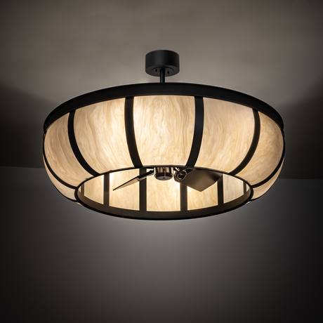 Warmly illuminated Prime Dome Chandel-Air in ambient room lighting.