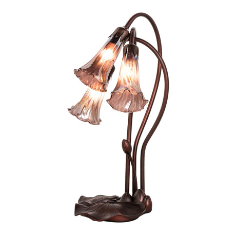 16-inch high purple iridescent Tiffany Pond Lily 3 light accent lamp with intricate stained glass design.