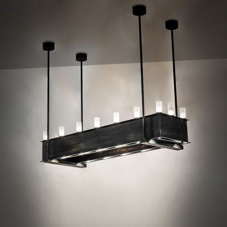 Ambient view of Quadrato 16 light oblong chandelier lit in a dark interior setting.