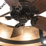Close-up of bronze fan hub and wooden blades with mica light backdrop.