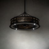 Dimly lit chandelier showing gentle glow through mica diffuser.