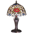 An elegant stained glass lamp with a flower pattern in warm autumn tones and unique craftsmanship.