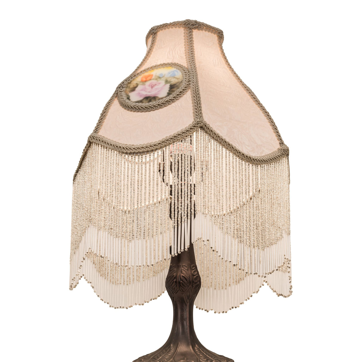 Sculpted metal base of the reverse-painted roses table lamp in a mahogany bronze finish.
