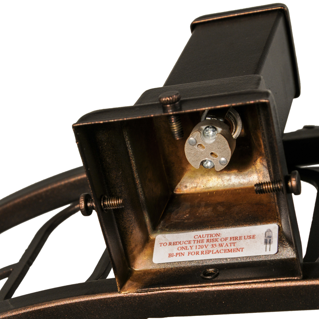 Close-up of bulb socket inside halogen downlight housing.