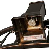 Close-up of bulb socket inside halogen downlight housing.