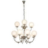 Full view of Revival gas and electric 12-light chandelier with frosted globes.