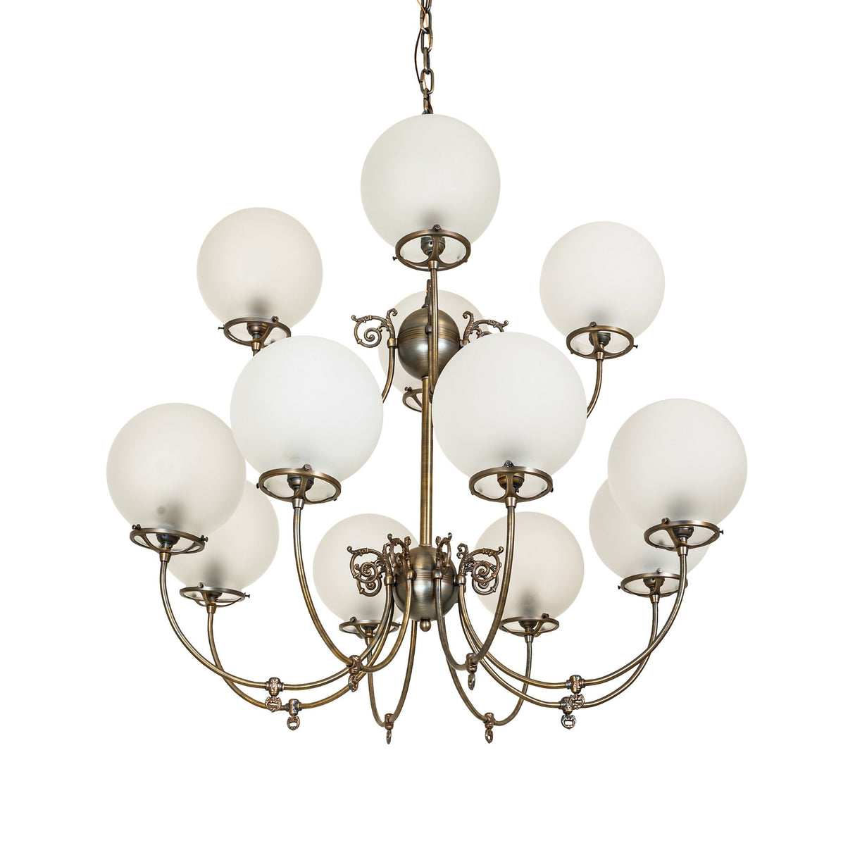 Unlit Revival gas and electric chandelier showing frosted globes and brass frame.