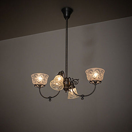 Revival gas and electric chandelier shown installed, casting warm ambient light in interior space.
