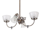 Unlit revival gas and electric chandelier highlighting etched glass shades and brass detailing.