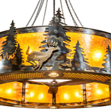 Roosevelt Big Ass Chandel-Air close-up showing handcrafted metalwork and amber illumination.