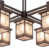 Detail view of chandelier metal frame and arm connection.