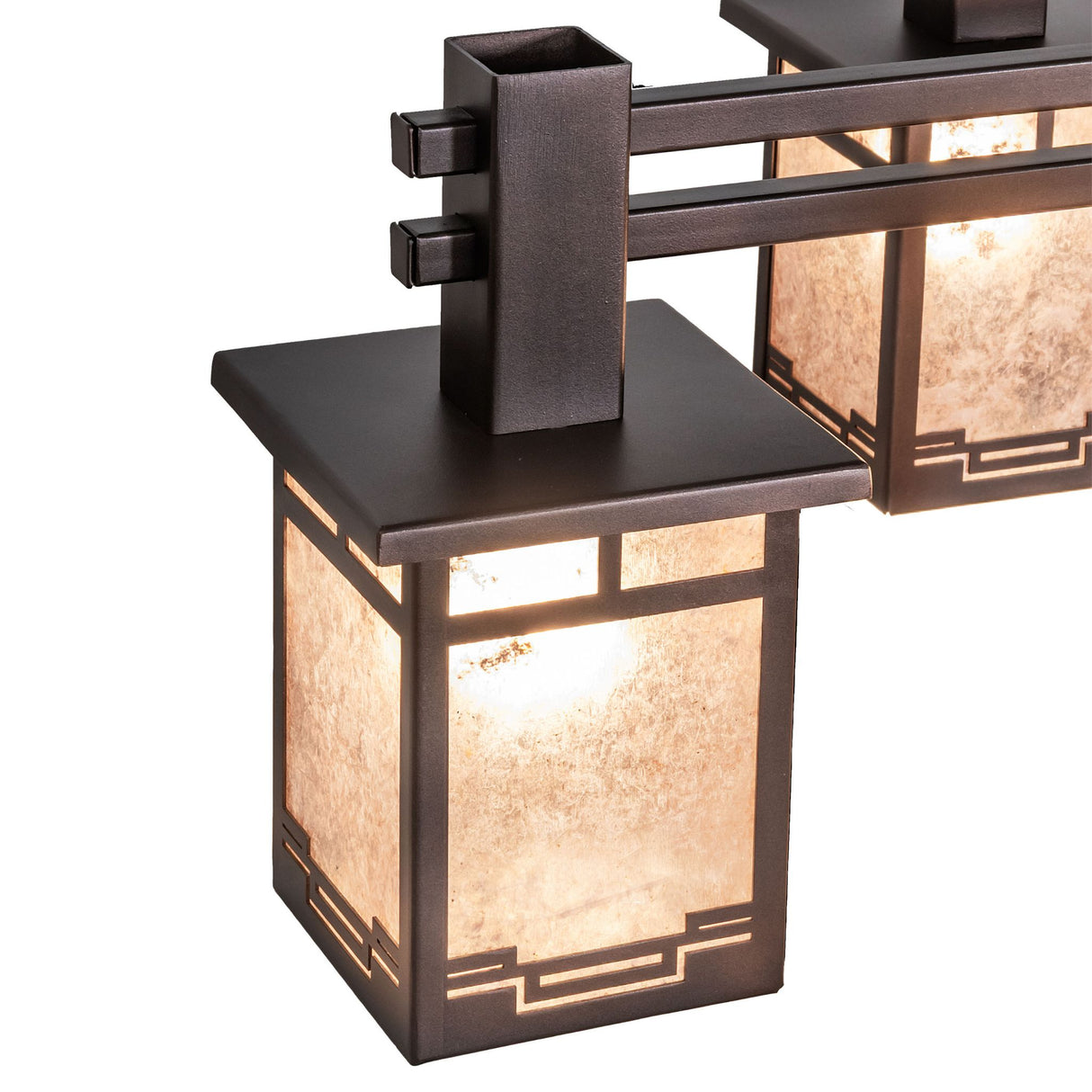 Close-up of chandelier lantern with silver mica diffuser panels.