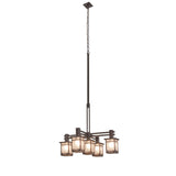 Full view of chandelier shown fully illuminated with rectangular lantern shades.