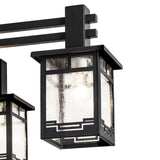 Closeup of Roylance chandelier clear seeded glass lantern with geometric trim.