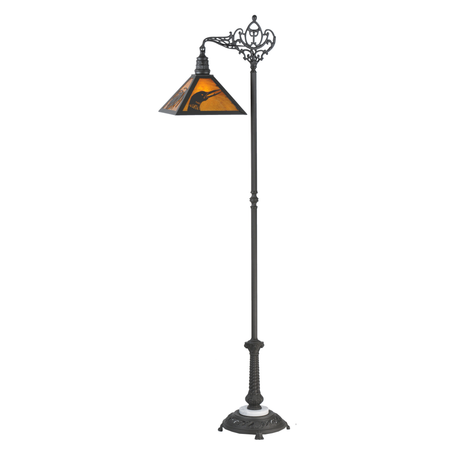 Rustic loon pine needle floor lamp with lit amber glass shade.
