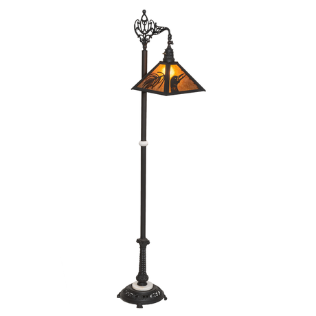 Rustic loon pine needle floor lamp with amber mica shade lit.
