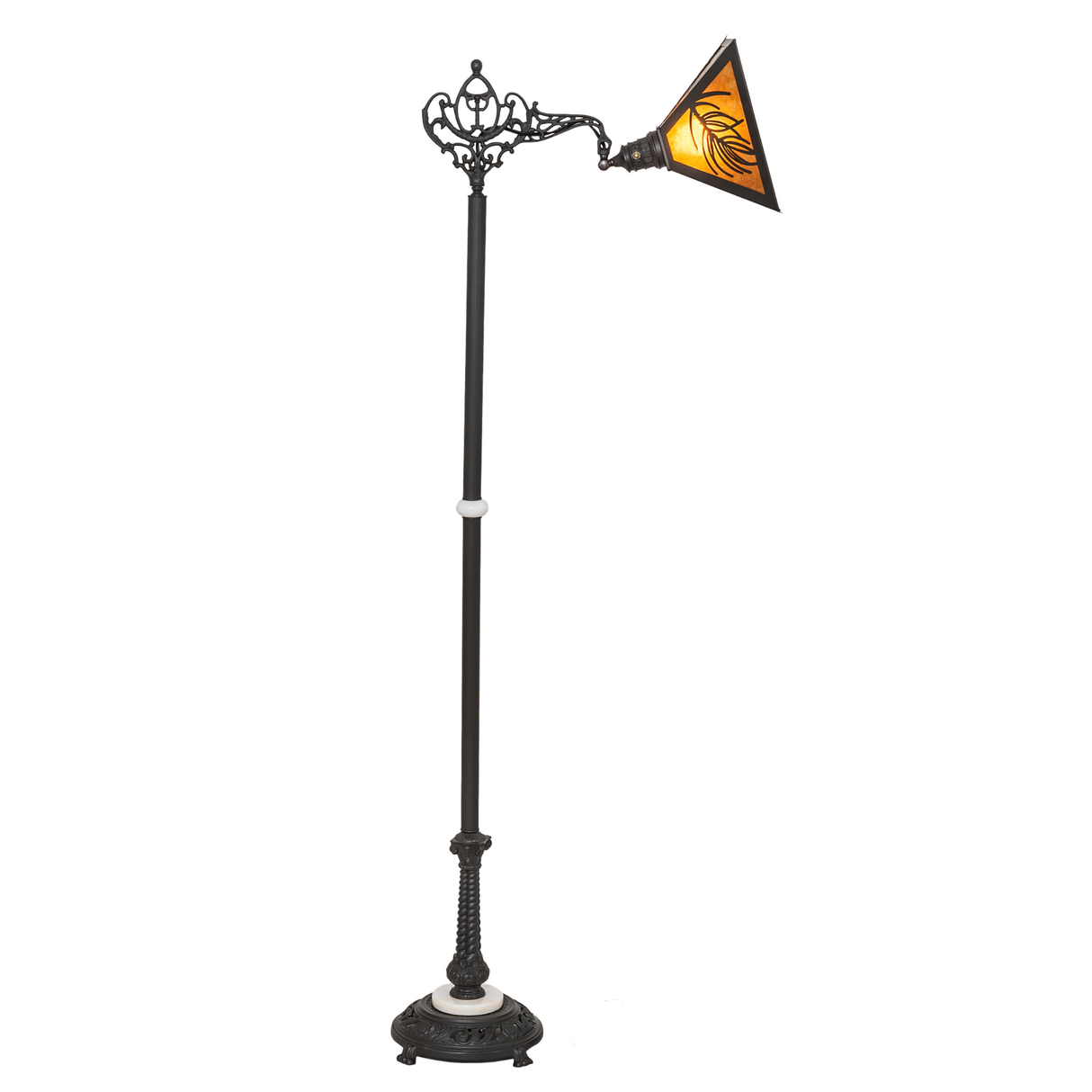 Side lit view highlighting pine needle cutout on rustic lamp shade.