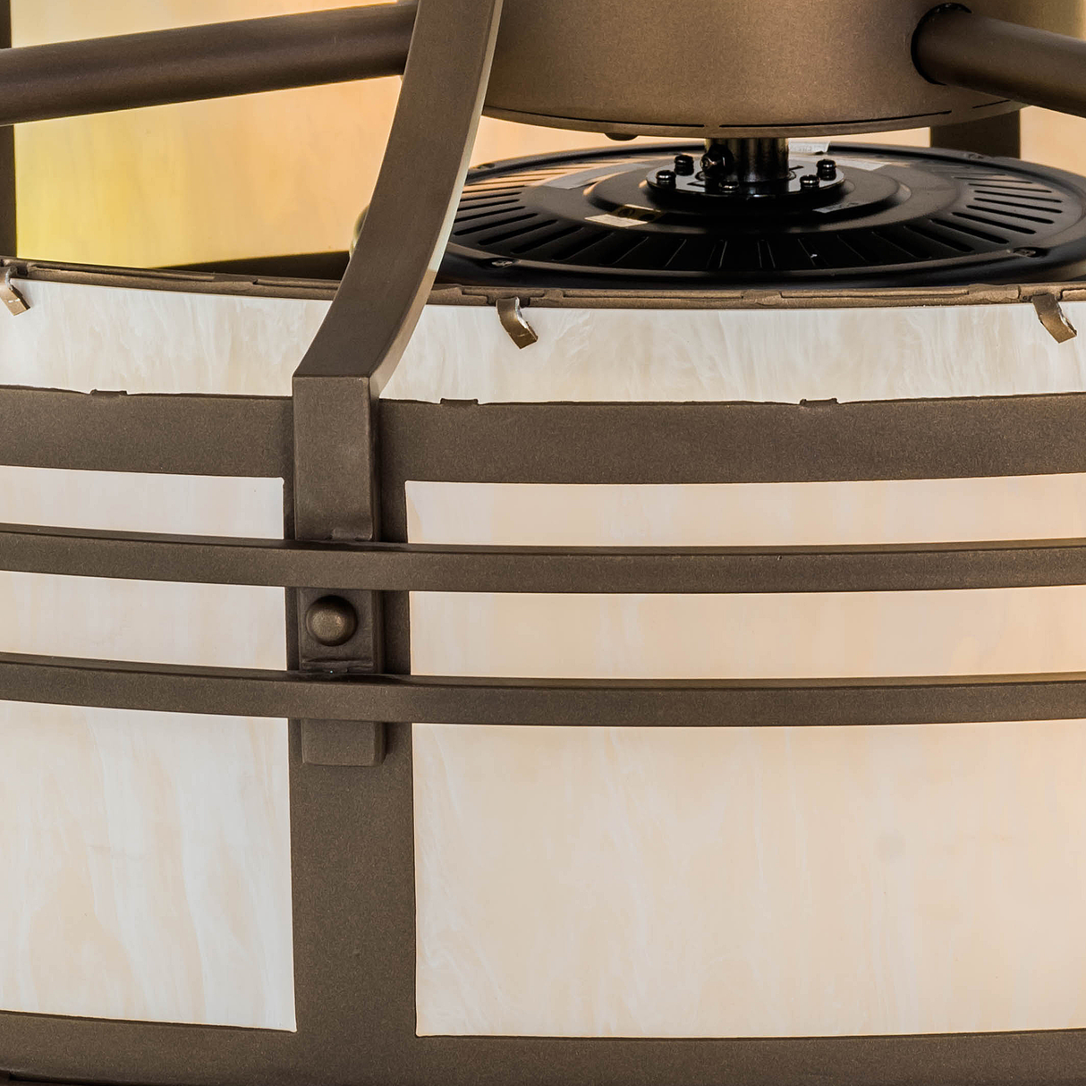 Upper tier closeup highlighting soft Idalight glow and metal supports.