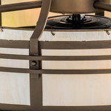 Upper tier closeup highlighting soft Idalight glow and metal supports.