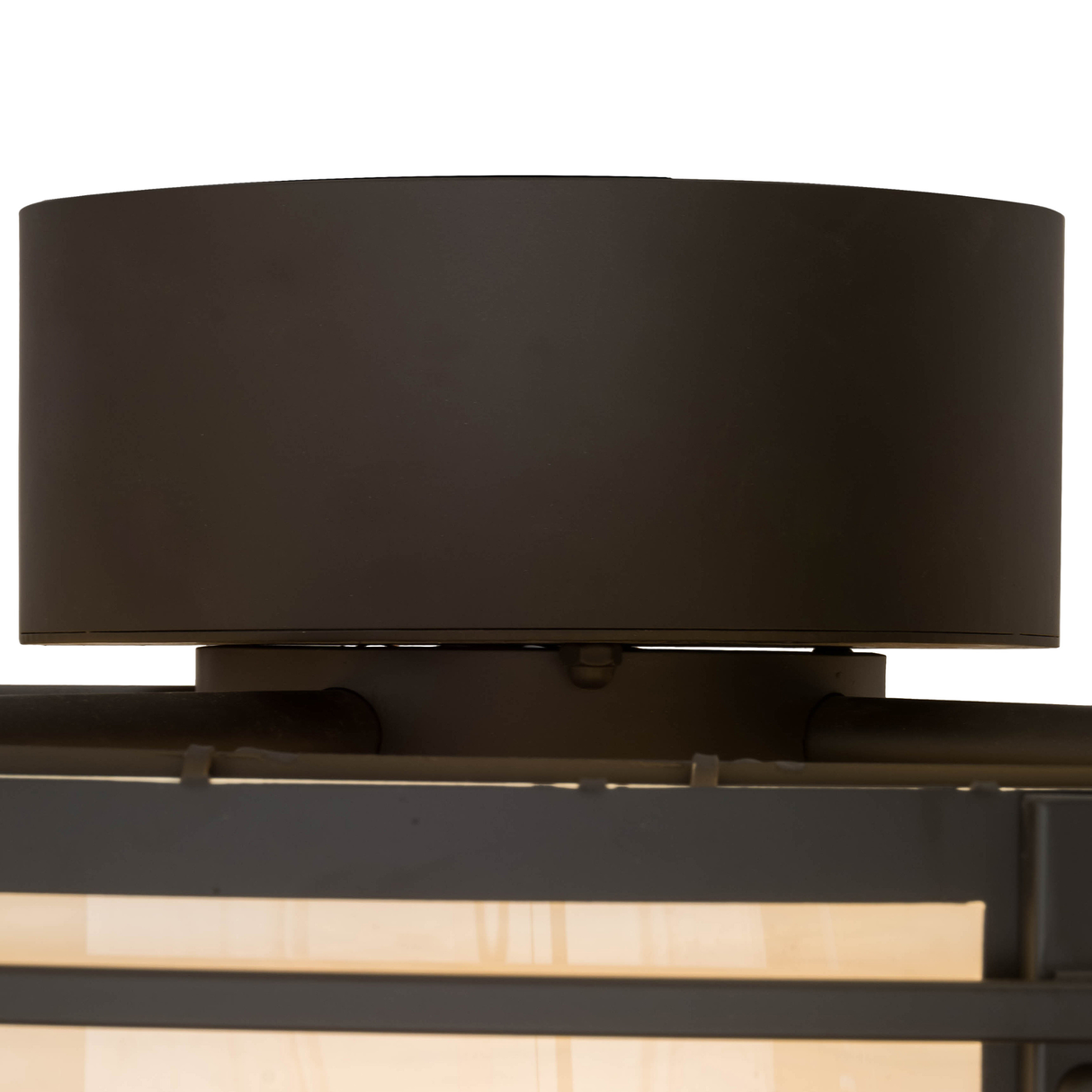 Close-up of ceiling canopy with smooth Oil Rubbed Bronze finish.