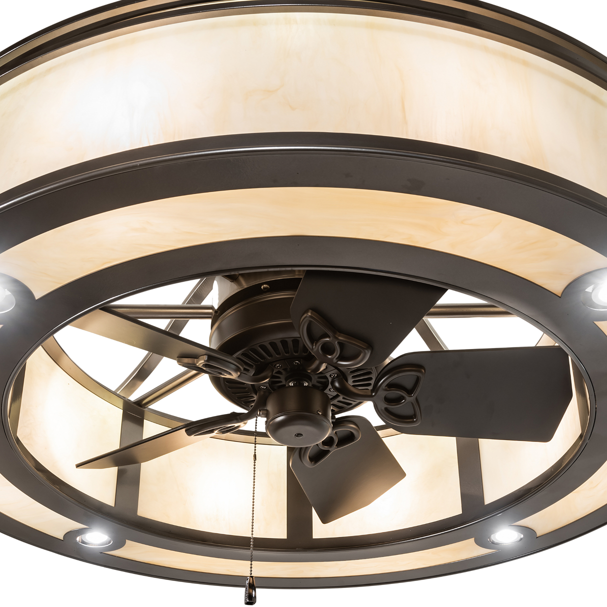 Closeup of fan motor and pull chain integrated into chandelier housing.