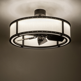 Smythe Craftsman Chandel-Air casting warm ambient light in room setting.